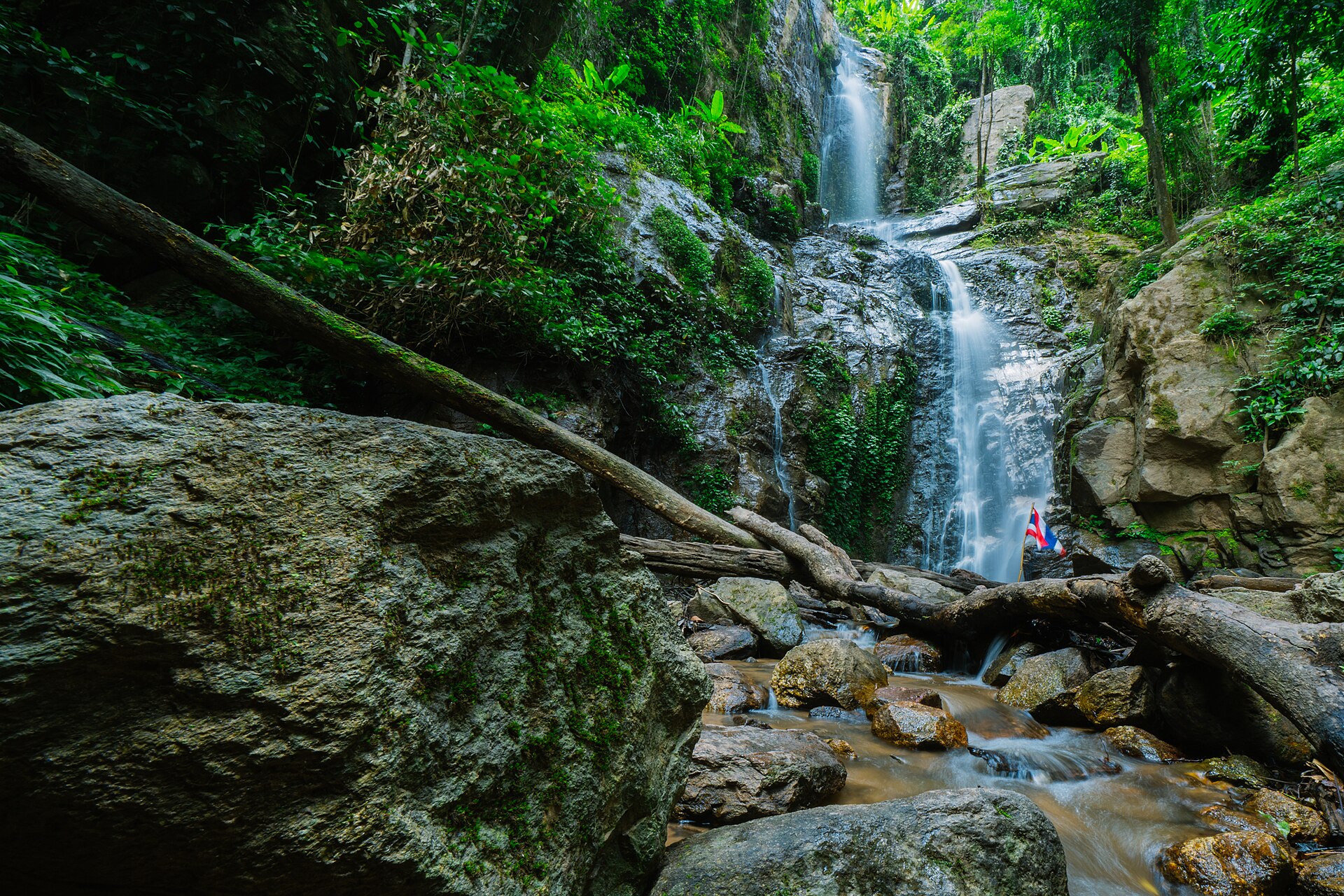 The lush Huay Tung Tao Waterfall tucked inside the rainforest, serving as the beautiful final destination of the nature trail.