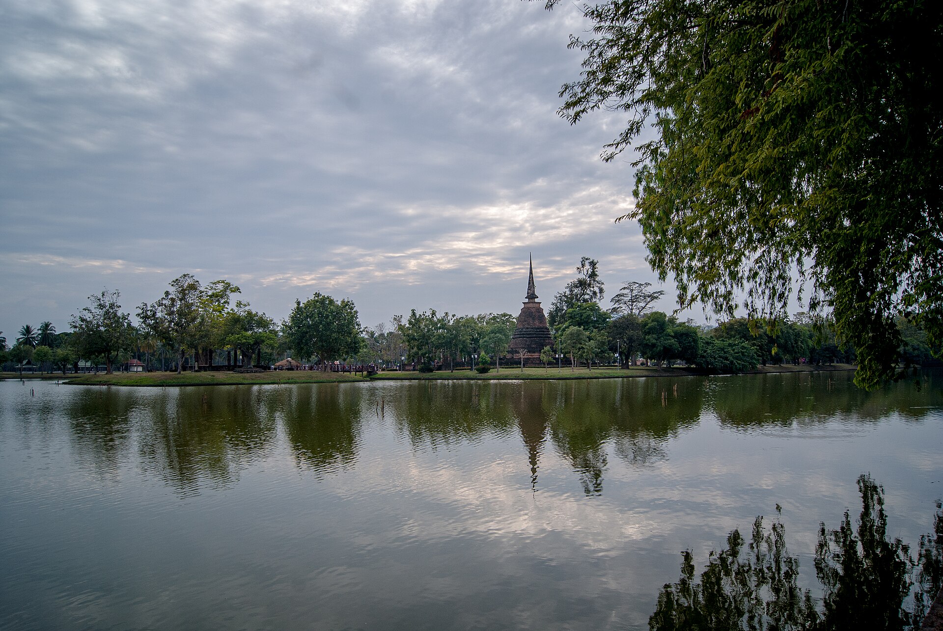 Sukhothai Historical Park in Thailand preserves the ruins of the 13th- to 14th-century capital of the Sukhothai Kingdom. The historical park includes 193 ruins within a walled area, including the royal palace and 26 temples. It is a UNESCO World Heri